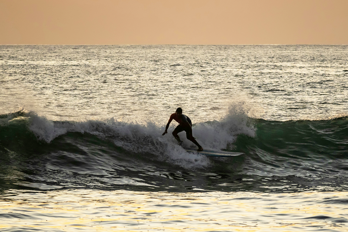 Surfing in Playa Guiones, Nosara
